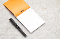 Rhodia No. 13 A6 Notepad - Orange, Lined